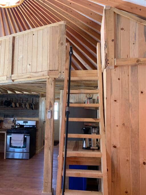 Loft access via ships ladder. (Most lumber is locally sourced and milled beetle-kill pine.