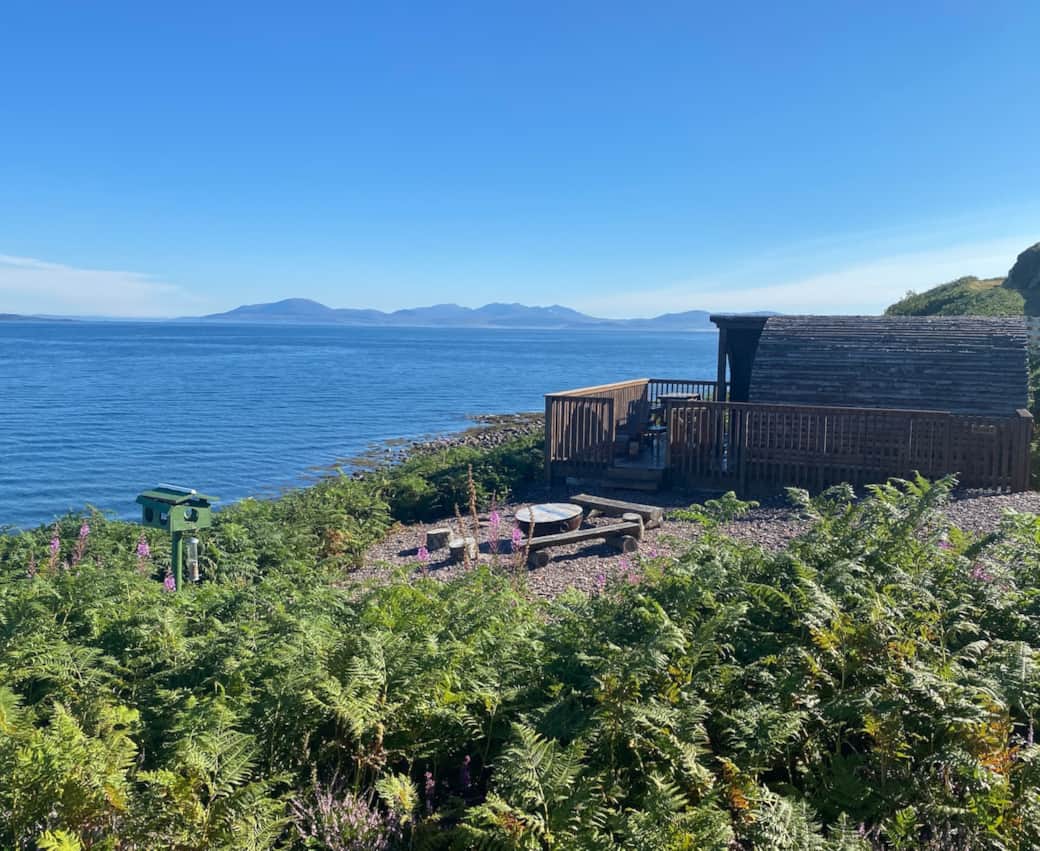 Minke Cabin is perched overlooking the sea with stunning views and complete privacy