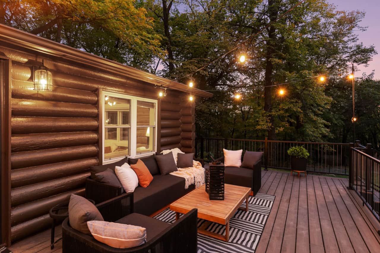 Outdoor sectional on the deck. Blankets live in the basket for cool nights.