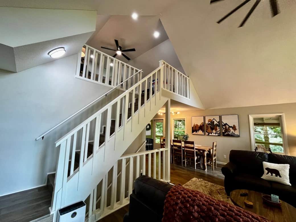 Stairs to the loft where you'll find a great view from up high.  Notice the air purifier at the base of the steps which filters all the air in the cabin twice an hour.