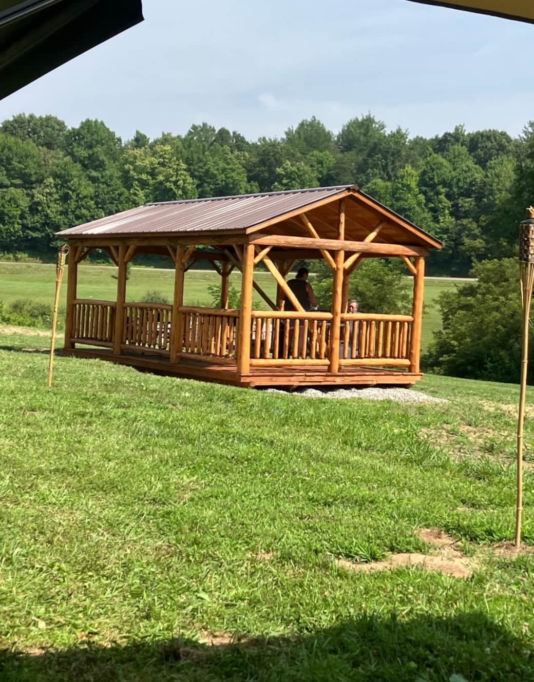 Log gazebo with water and electric on 12 private acres