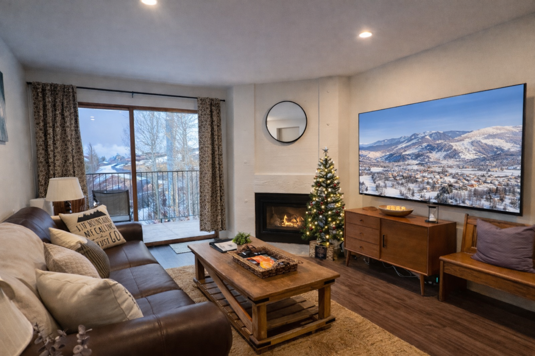 Cozy living room with 72" Smart TV