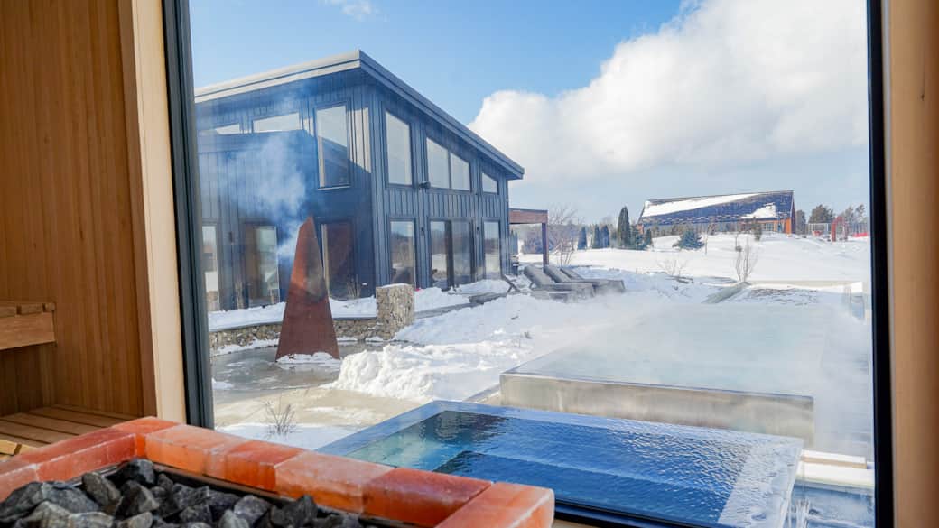 Sauna View of the Infinity-Edge Thermal Pool & Cold Plunge