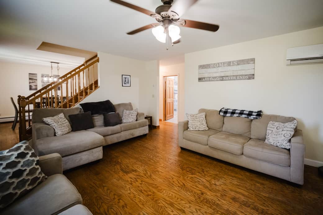 Large living room with chaise sofa, queen sofa bed, and love seat. Large flatscreen SmartTV. Large living room with chaise sofa, queen sofa bed, and love seat. Large flatscreen SmartTV.