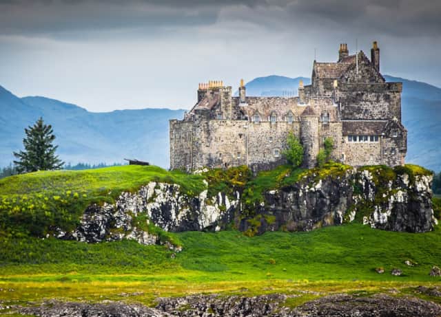 Duart Castle on its grassy headland on Mull