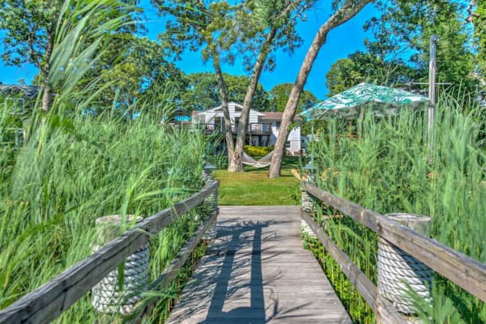 Boardwalk through the beach grass down to the dock