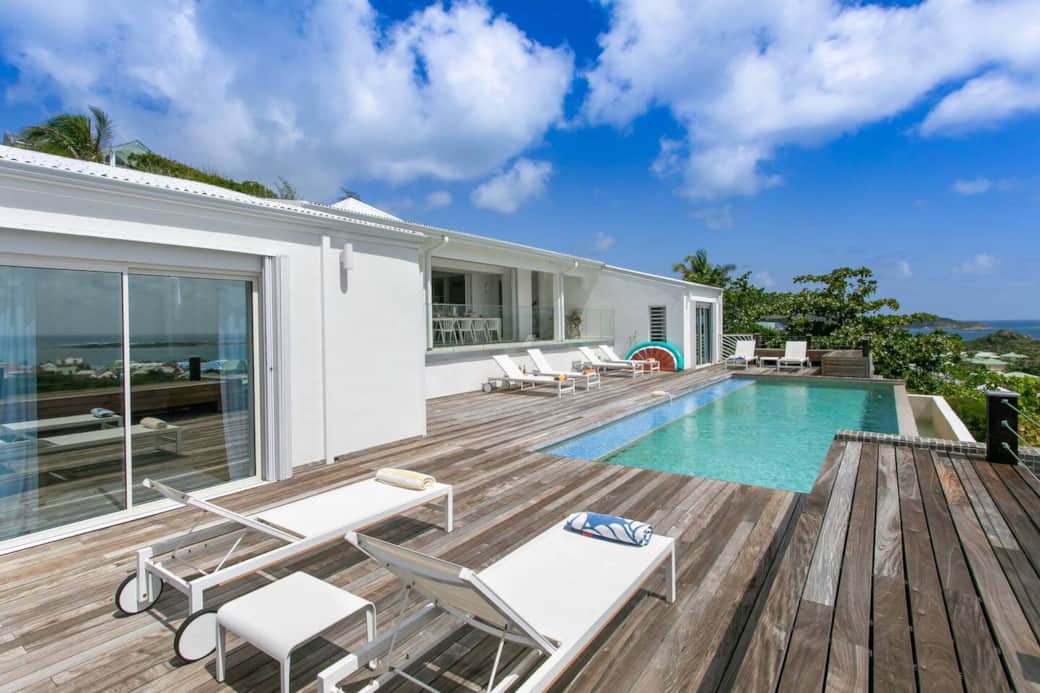 Sun chairs around the pool Mango