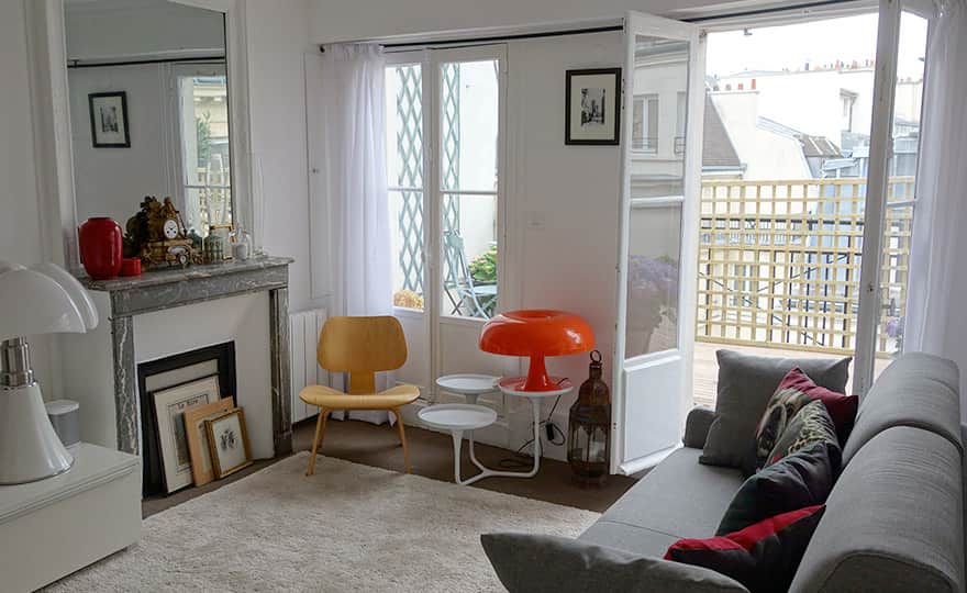 Classic mid-century living room with large garden terrace