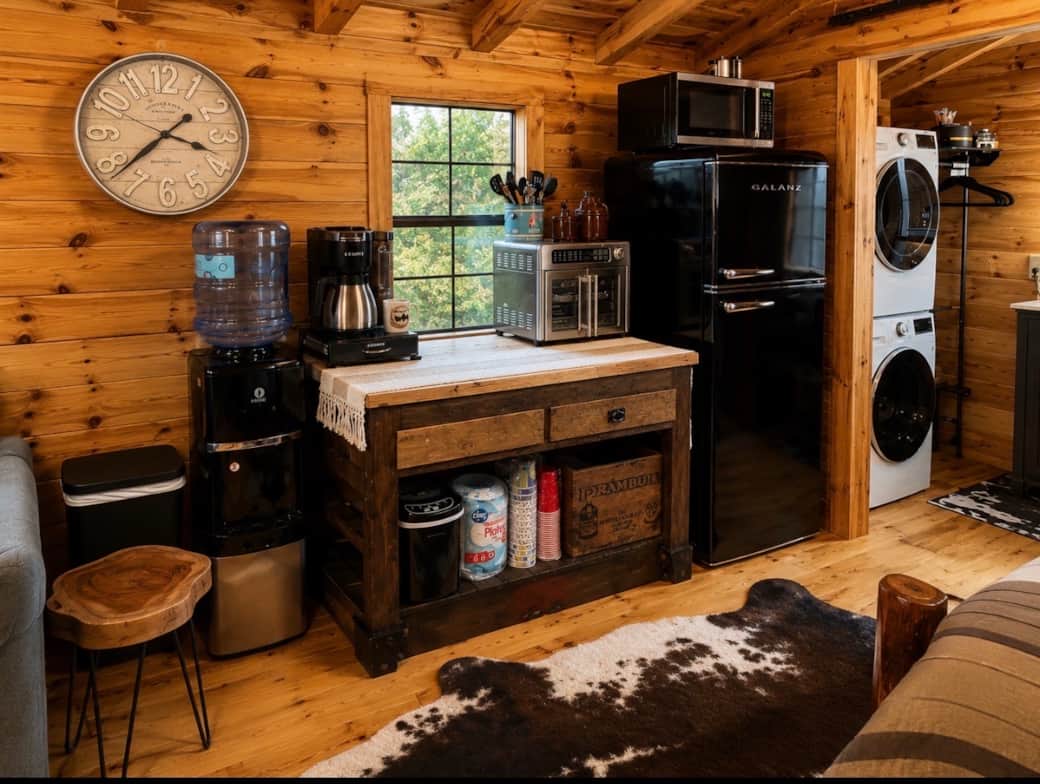 Kitchenette with fridge, microwave, coffee station and water cooler