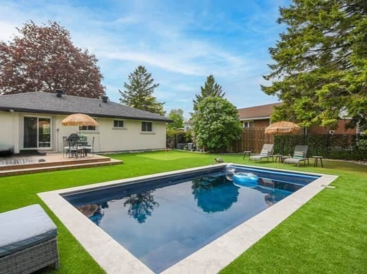 Refreshing inground salt water pool and sun seck area, perfect for summer relaxation in Ottawa