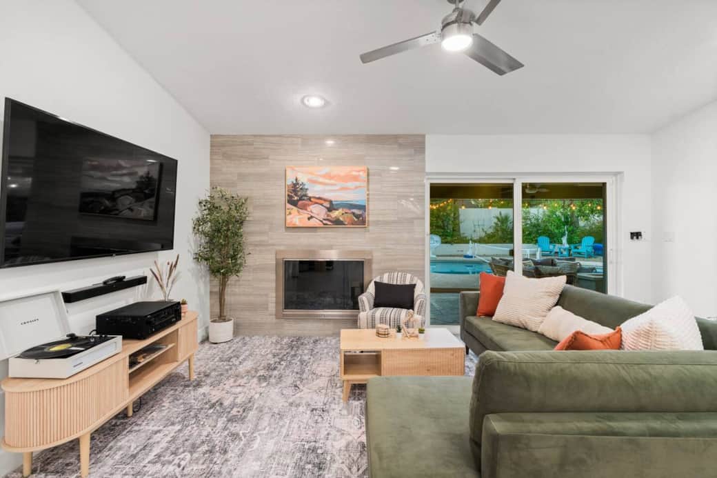 Living Room #2! Comfortable sectional, record player, board games, and a view of the pool. Living Room #2! Comfortable sectional, record player, board games, and a view of the pool.