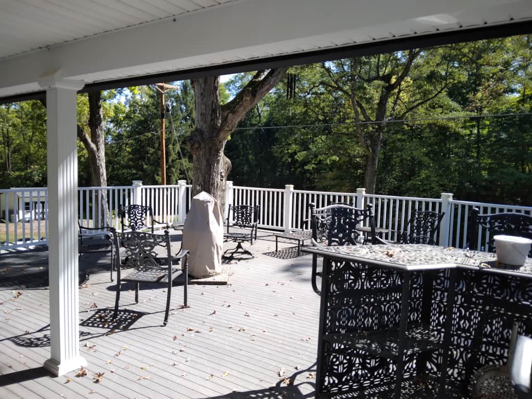 Outdoor patio includes bbq grill, bar and plenty of seating Outdoor patio includes bbq grill, bar and plenty of seating