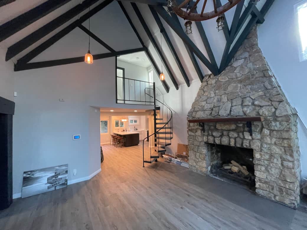 Spiral staircase leads to master bedroom 