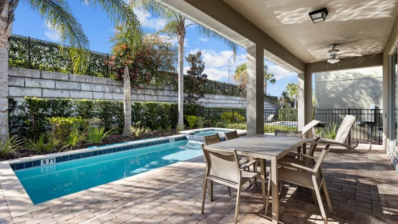 - Covered outdoor dining area beside the private pool