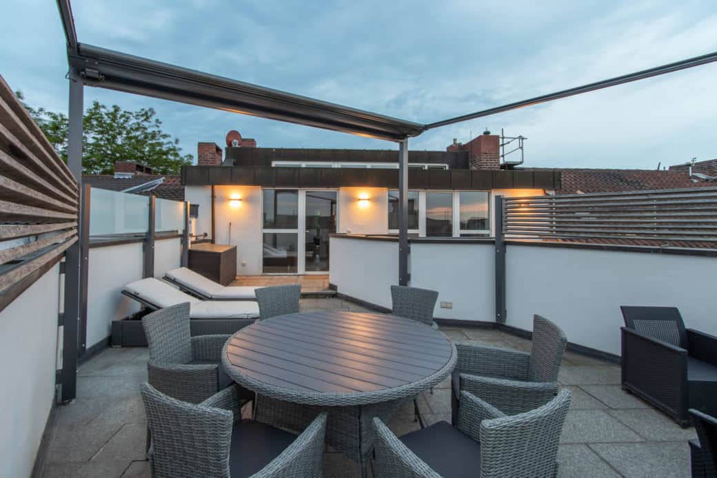 Roof terrace with dining table for shared meals