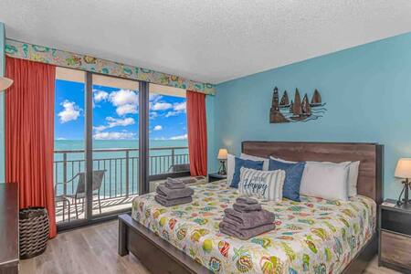 Master Bedroom with Oceanfront Views and private access to balcony!
