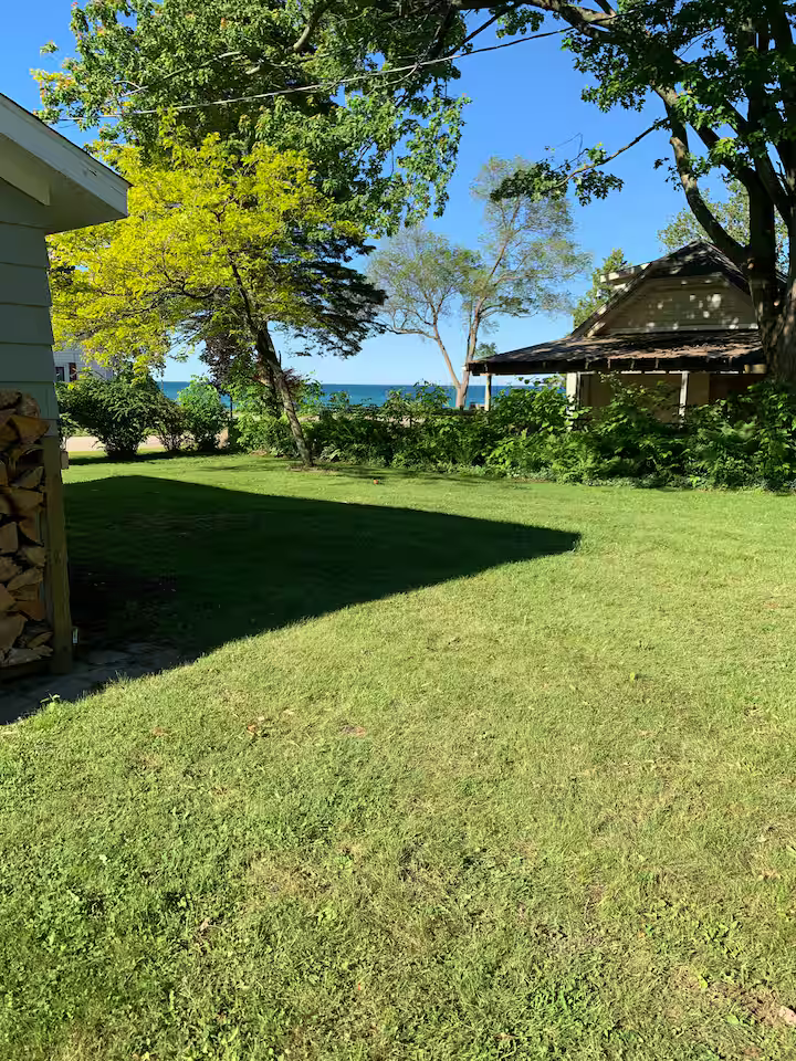 Grassy lawn with space for yard games 