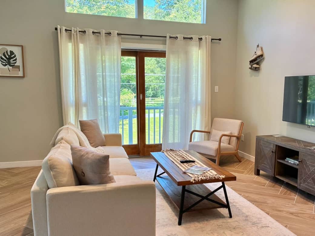 Living room with view of horse farm across the street Living room with view of horse farm across the street