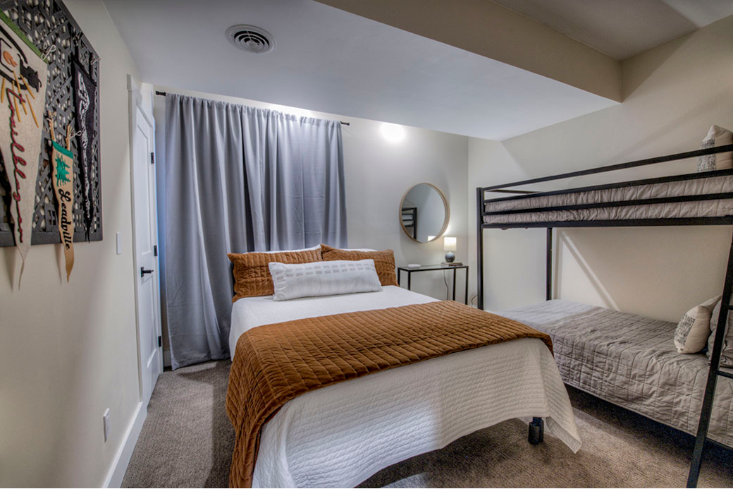 basement bedroom with queen bed and twin bunk bed basement bedroom with queen bed and twin bunk bed