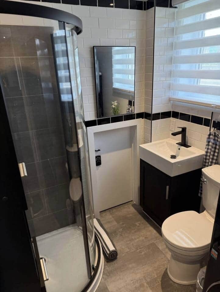 Bathroom with shower and laundry