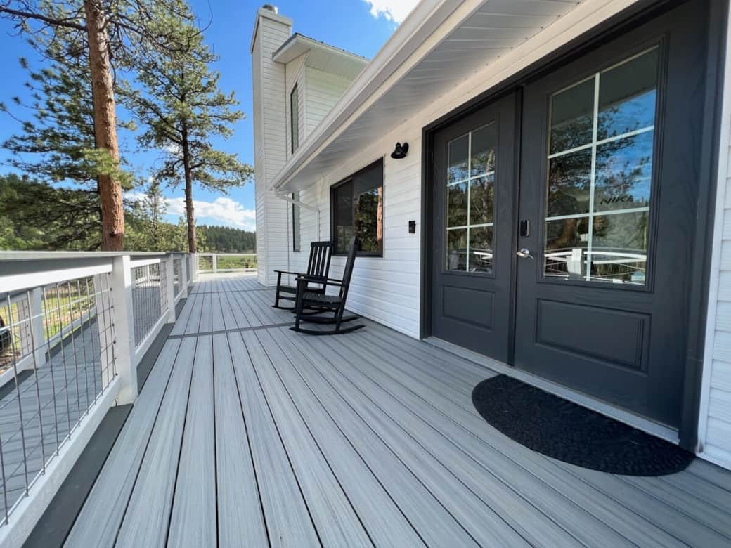 Rocking chairs on the wrap around deck outside the front door