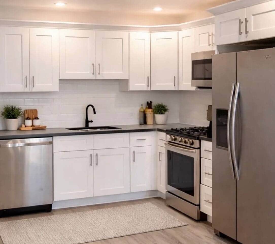 full  Kitchen with oven stove, double door refrigerator, and dishwasher.