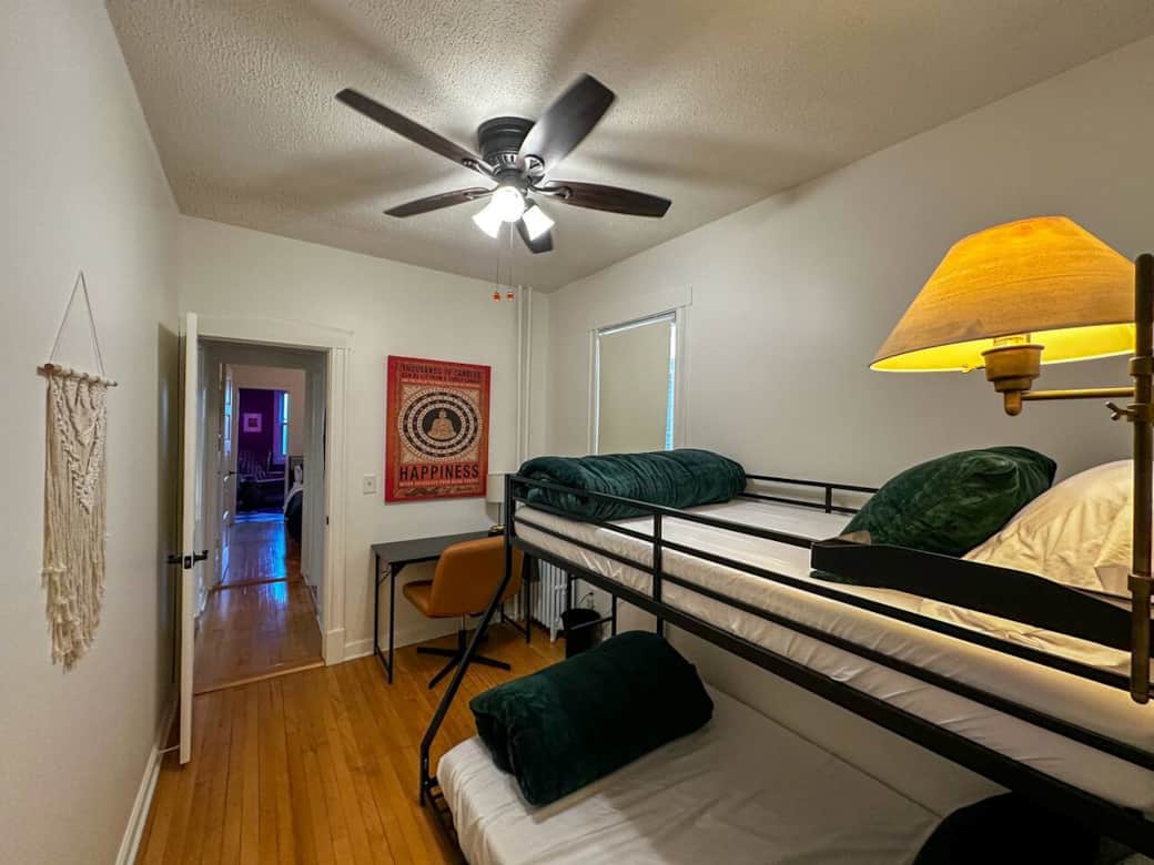 This room includes several lighting options as well as a room darkening shade.