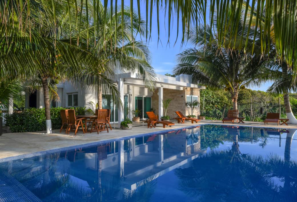 The patio set-up is perfect for home-cooked evening dinners or drinks by the pool. The patio set-up is perfect for home-cooked evening dinners or drinks by the pool.