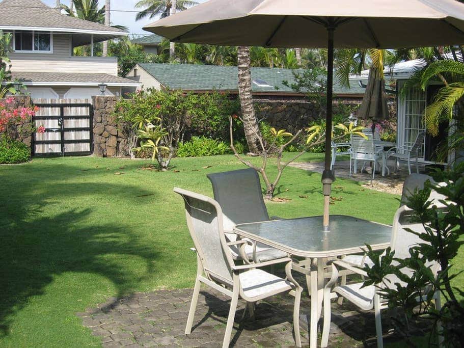 Tropical Breeze- Outside Dining Area with Front Yard