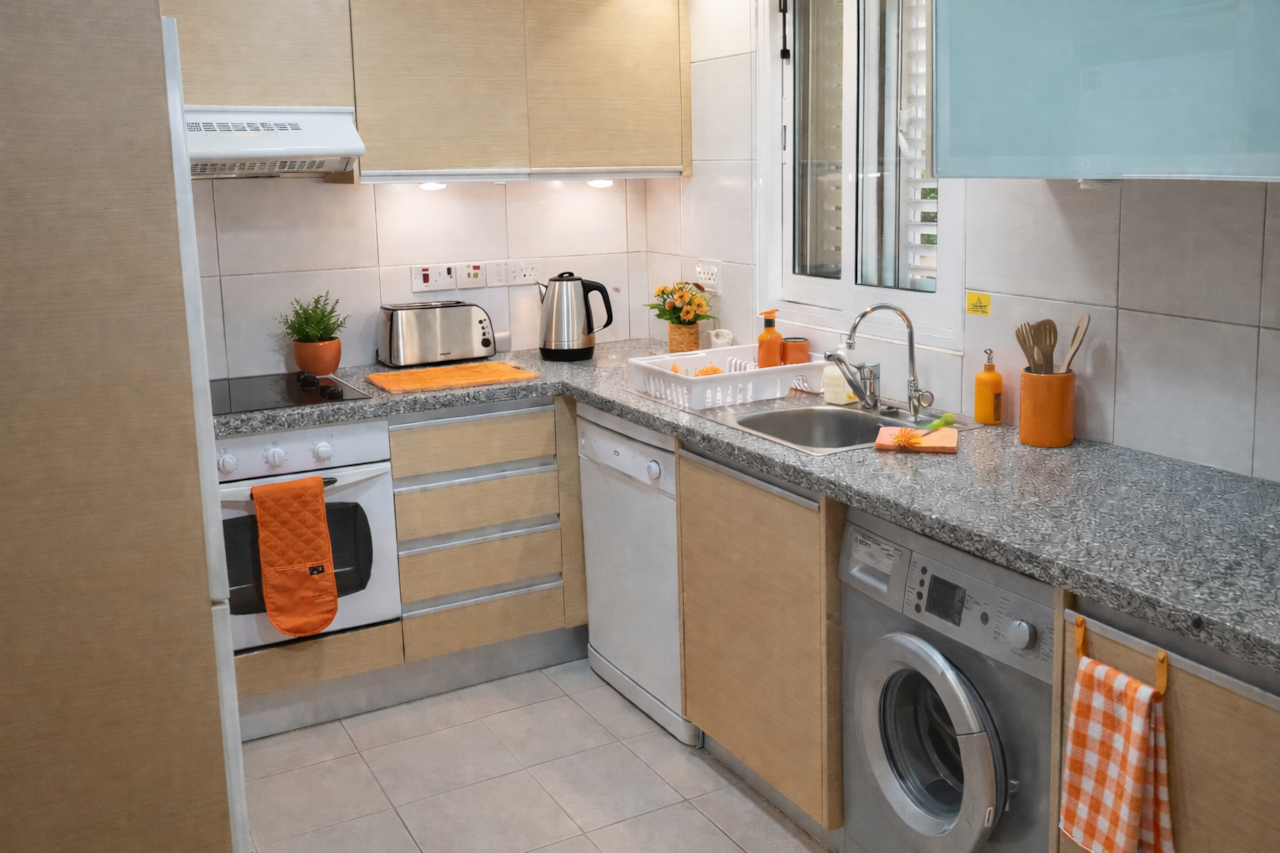 Modern kitchen with orange accents