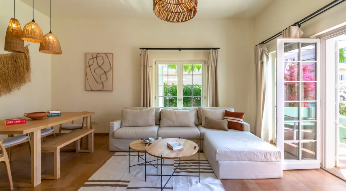 Living room with a sofa, dining table, and large windows, Portville B2 008, Gocek