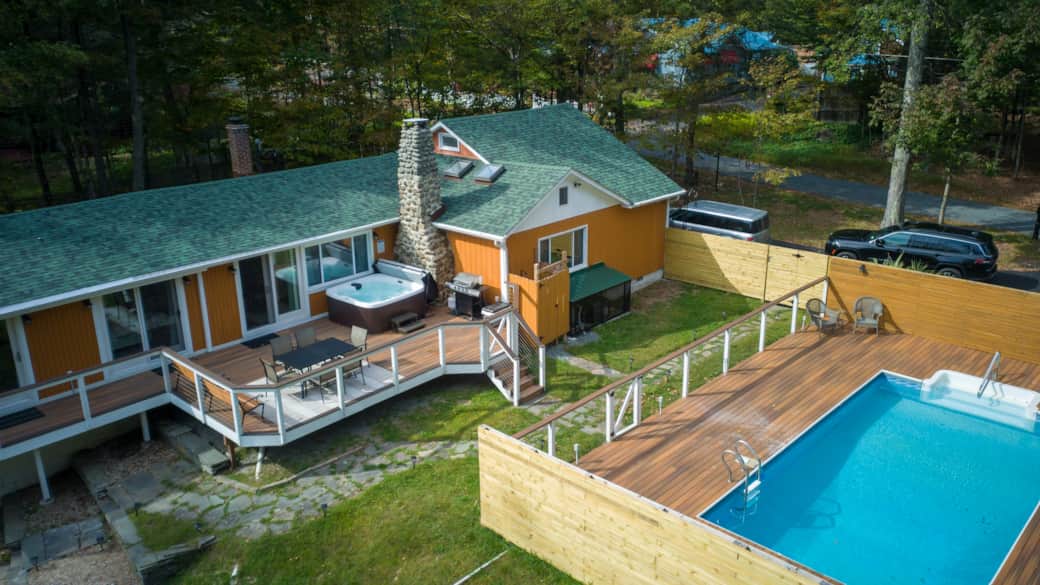 Massive heated pool and hot tub.