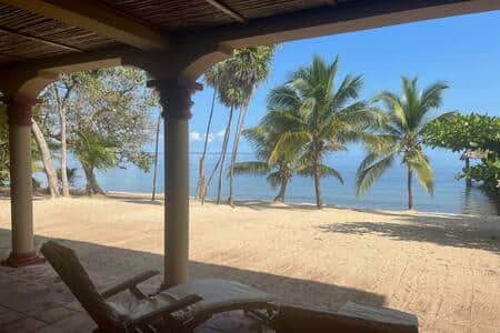 Patio view of the beach and ocean from the lower level suite B Patio view of the beach and ocean from the lower level suite B