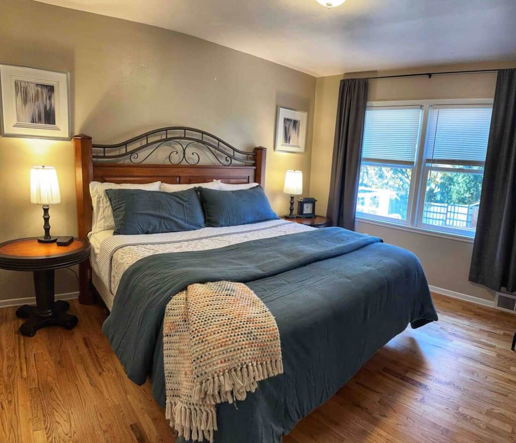Upstairs: King bed with options of extra firm and/or cooling pillows. Extra thick linen bedspread in winter.  Lighter blankets in summer. Large closet.