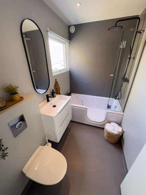 A unique shower/tub combination, perfect for relaxing after a long day of sightseeing