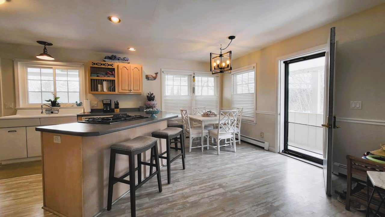 View of the kitchen and door to outside