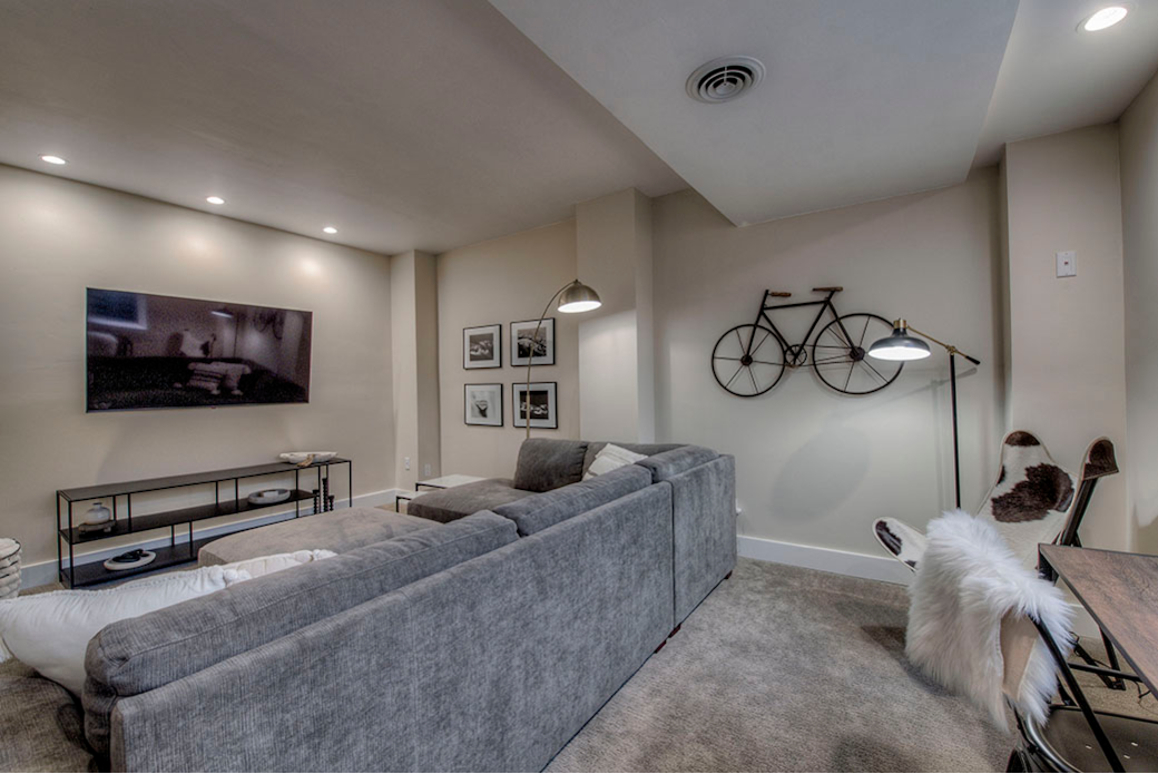 basement entertainment room with 65” tv basement entertainment room with 65” tv