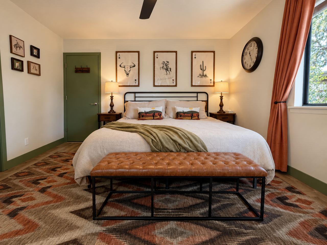 Inviting king bedroom with warm Southwest-inspired details. 