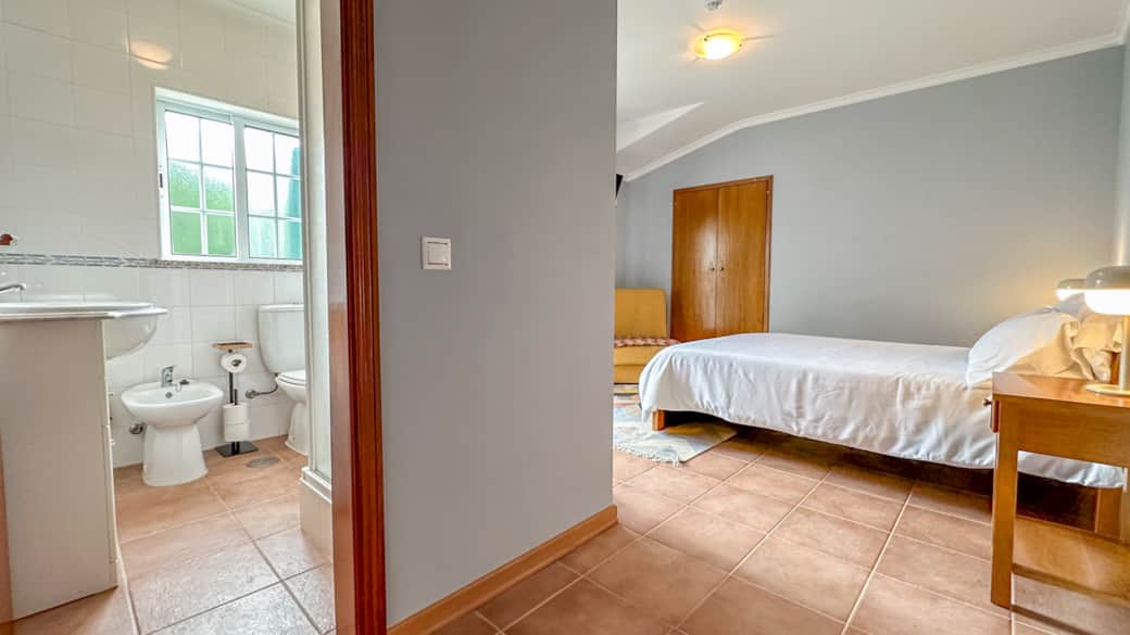 The room has an attached bathroom.