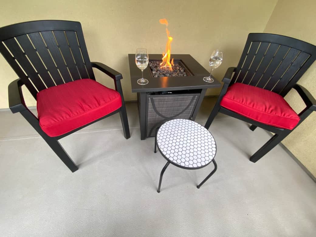 Relax with morning coffee on deck. Sip wine in evening by propane fire.