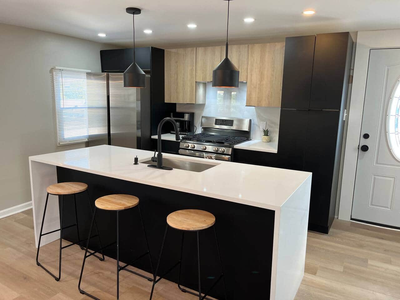 Full kitchen with dishwasher , microwave, oven range, hood, 36 inch refrigerator with ice and water.