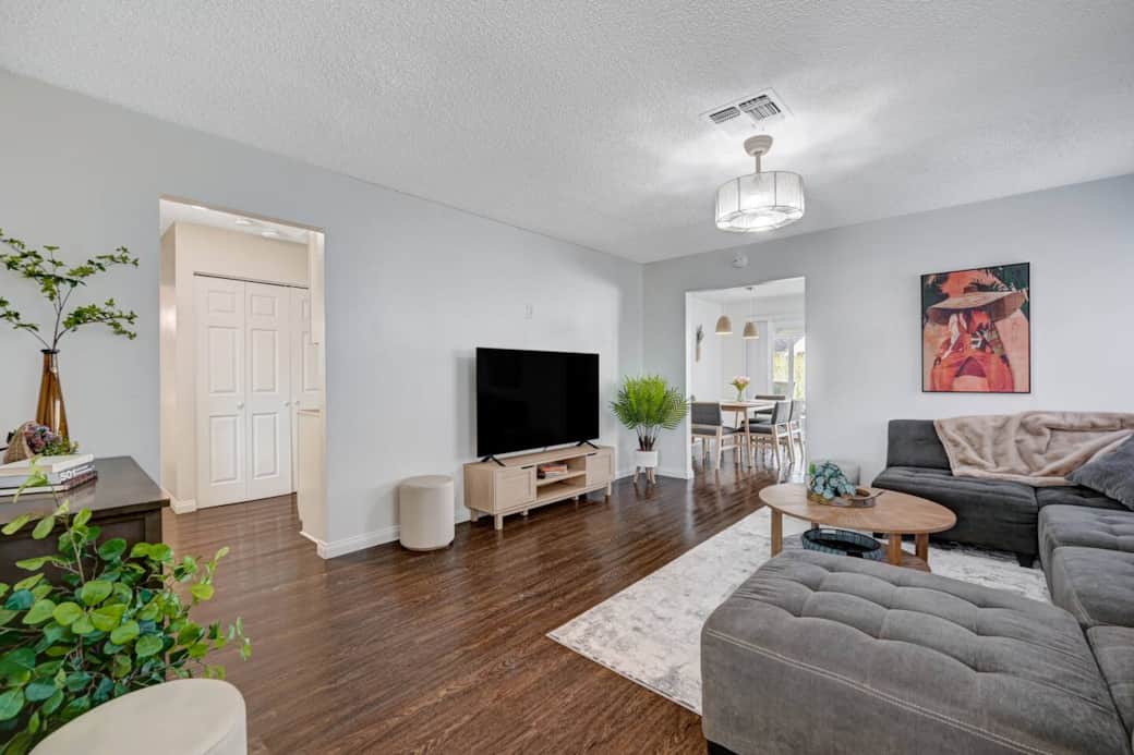 Living Room with 65" LG Smart Tv with Apple tv, Netflix, Hulu and Paramount+