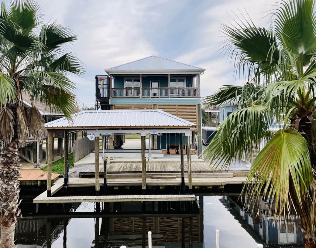 Waterfront escape with great outdoor space, dock, and stunning sunset views. Waterfront escape with great outdoor space, dock, and stunning sunset views.