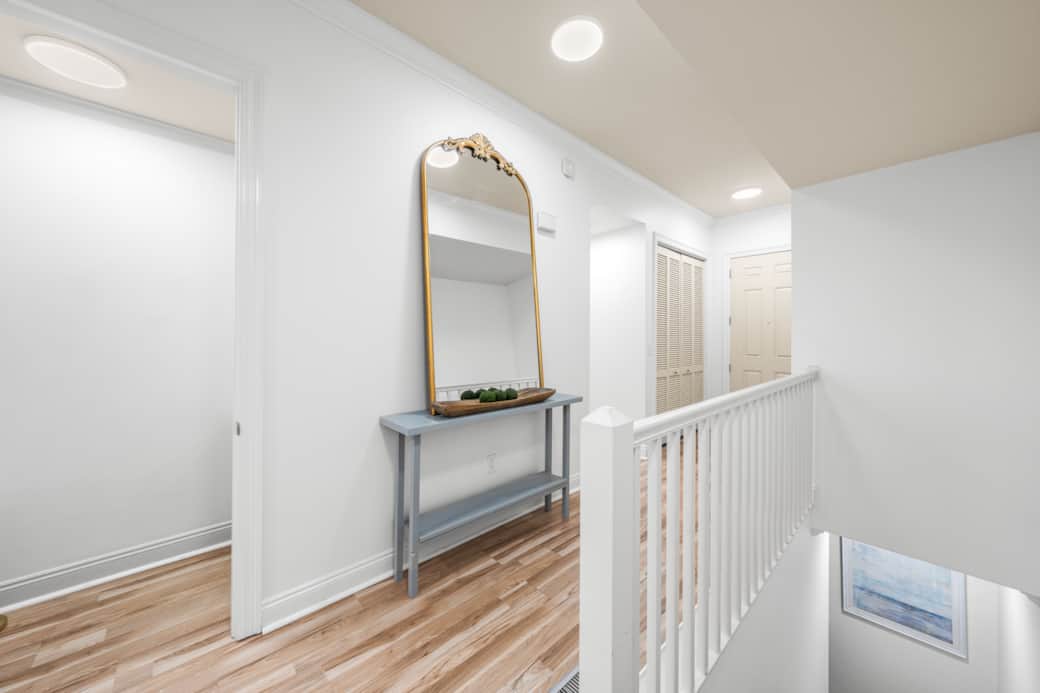 Entry Hallway and Upstairs Half bath Entry Hallway and Upstairs Half bath