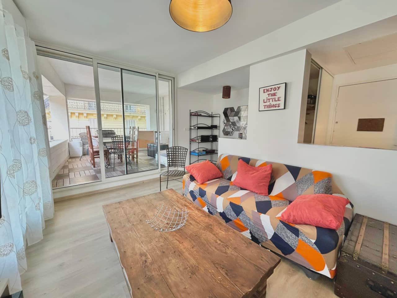 Living room, sofa, TV, desk, fan, terrace