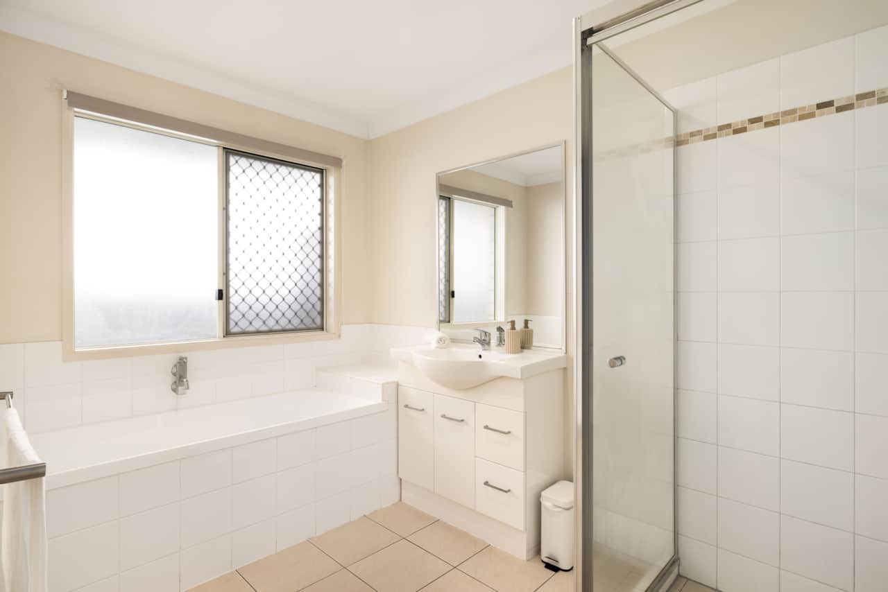 Bathroom: Clean, well-kept bathroom with bathtub included