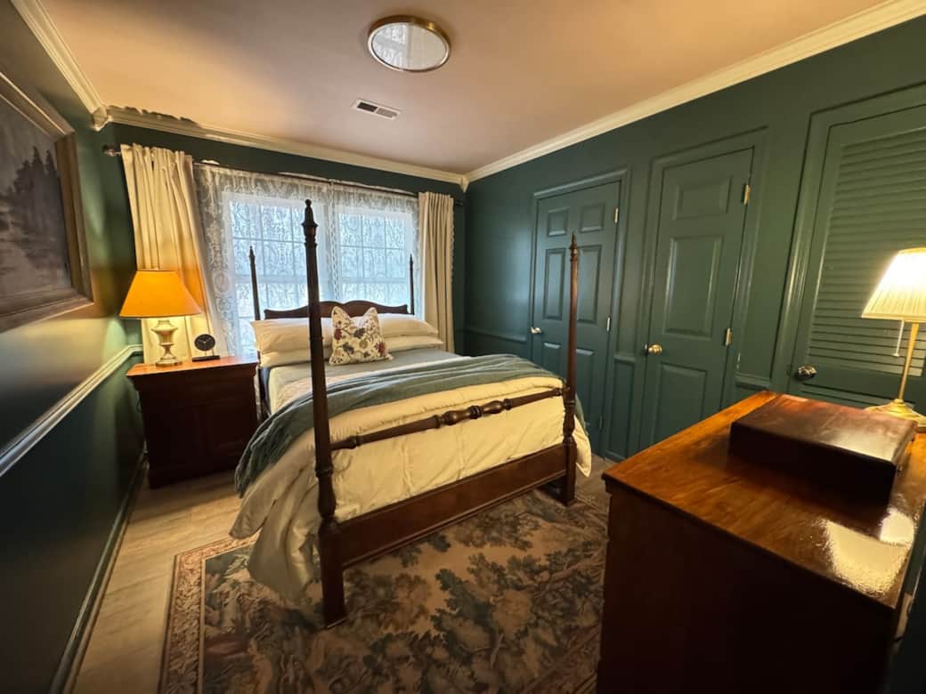 Cozy second bedroom with a full size bed.