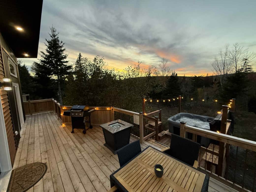 Sunset soak in the private hot tub — your perfect evening escape.