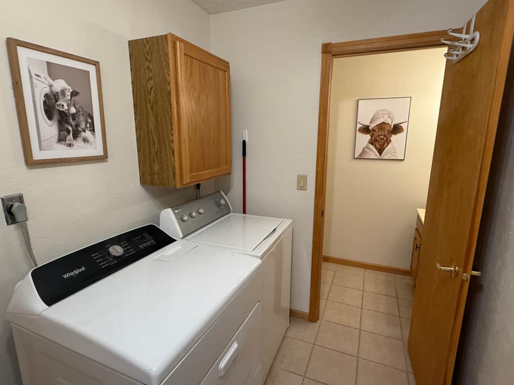 Laundry Room off hallway coming in from heated garage. Entire home has radiant infloor heat. Laundry Room off hallway coming in from heated garage. Entire home has radiant infloor heat.