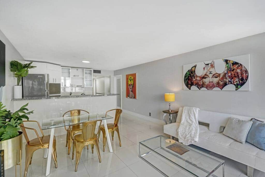 Dining area for 4, living area, fully equipped kitchen, balcony access, Roku streaming TV